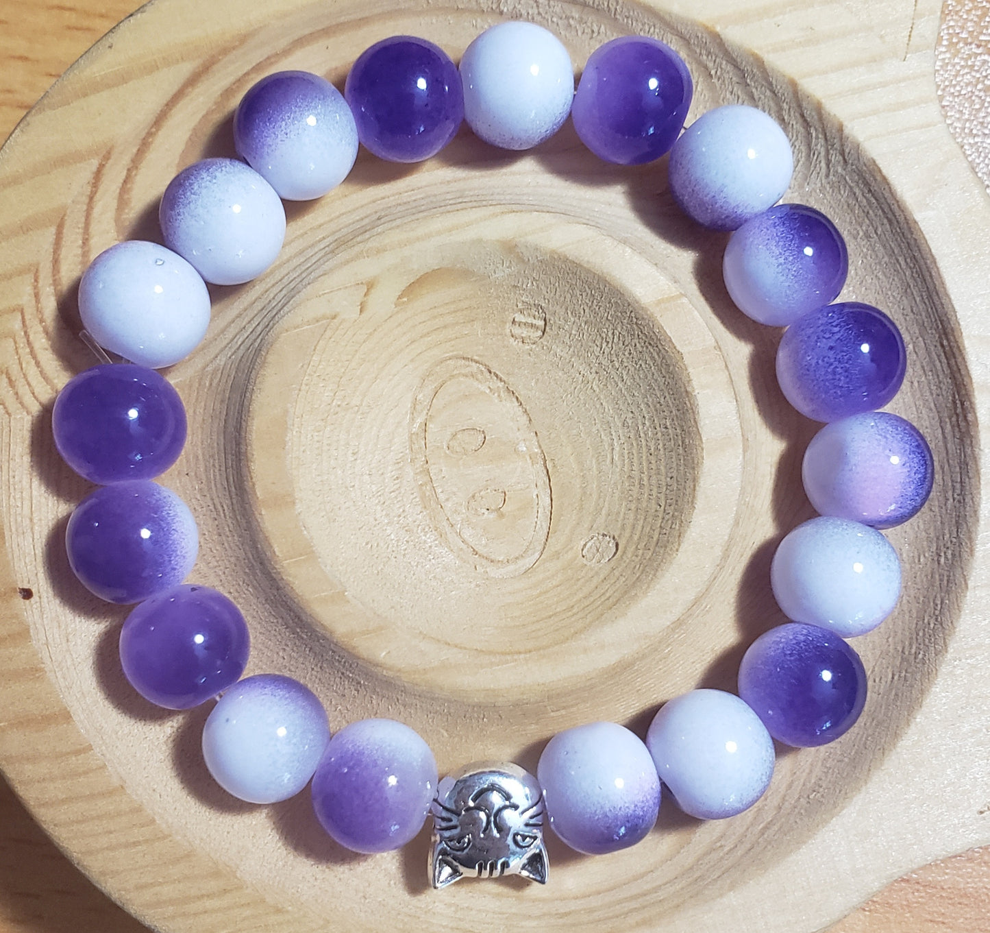 Purple and white bracelet